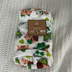 White Hand Towel with Green and Brown Accents